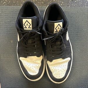 Nike Air Jordan Sneakers. Men’s 12.  Usual wear. Bread stretch laces.